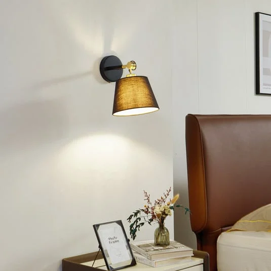 Aplique de pared Lucande Marvaine, negro/oro, regulable