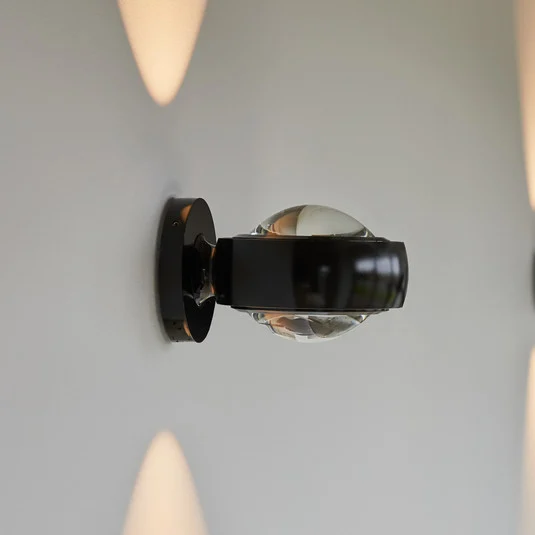 Aplique de pared LED LOOM DESIGN Optic, aluminio negro Ø 12 cm