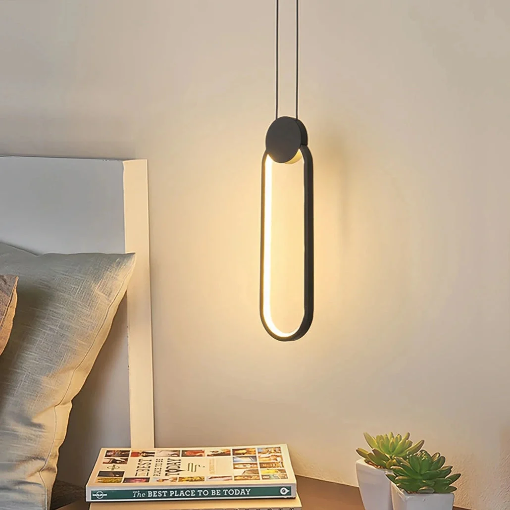 Lámpara colgante ovalada LED negra regulable de estilo moderno para dormitorio