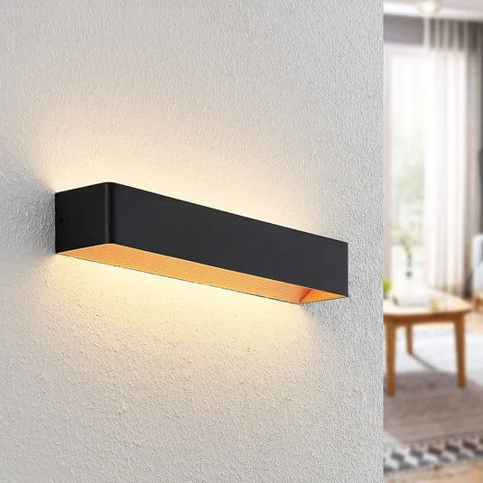 Arcchio Aplique de pared LED Karam, 53 cm, negro, metal, arriba/abajo